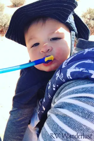 Baby Drinking Out of CamelBak
