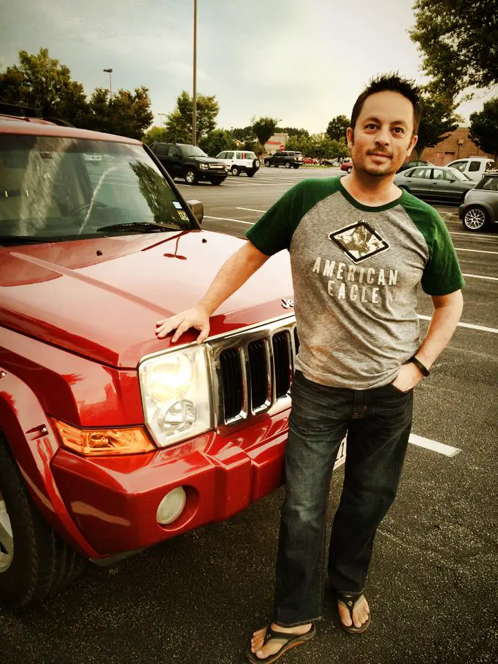 Eric of RV Wanderlust in front of Smaug the jeep