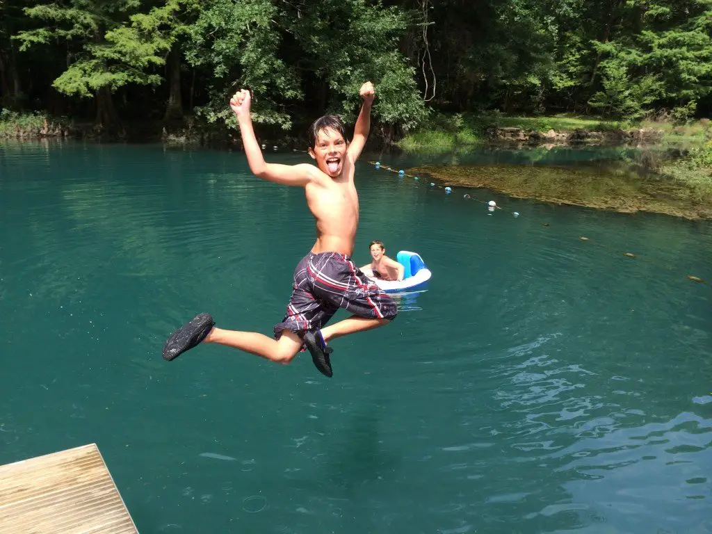 Javen catching some air at the swimming hole at Florida Caverns State Park