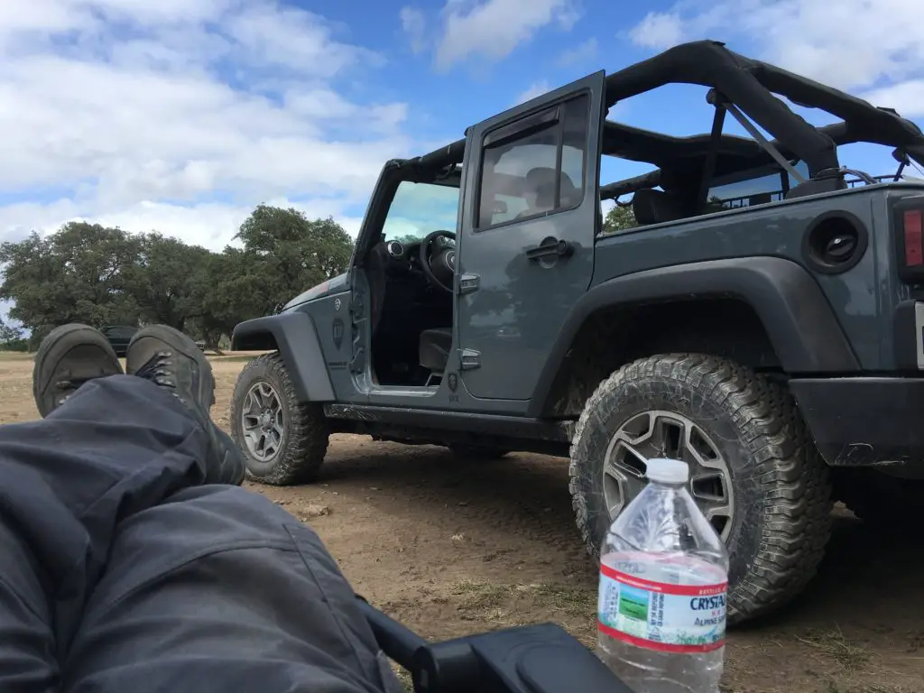 Jeeper relaxing next to his Jeep