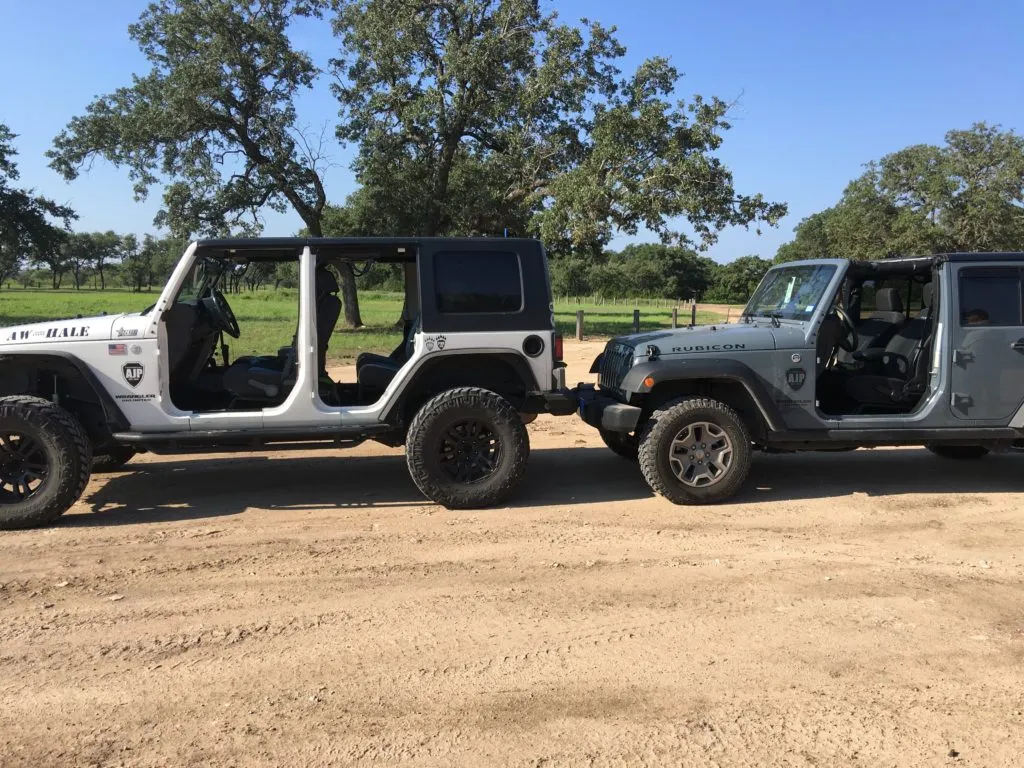 One Jeep wrangler right behind the other