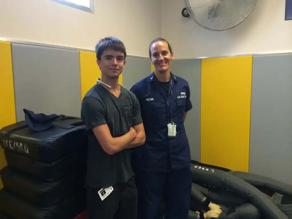 Darius with the Assistant School Chief of the Coast Guard Marine Law Enforcement Specialist School