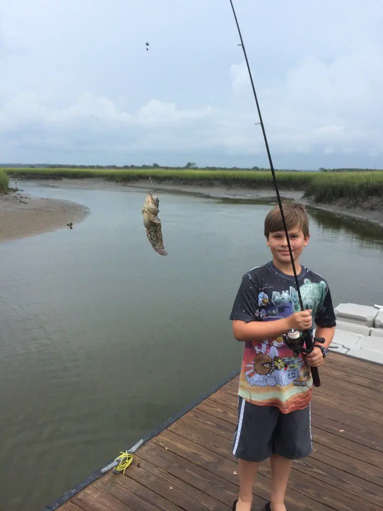 Silas Highland catches his first fish