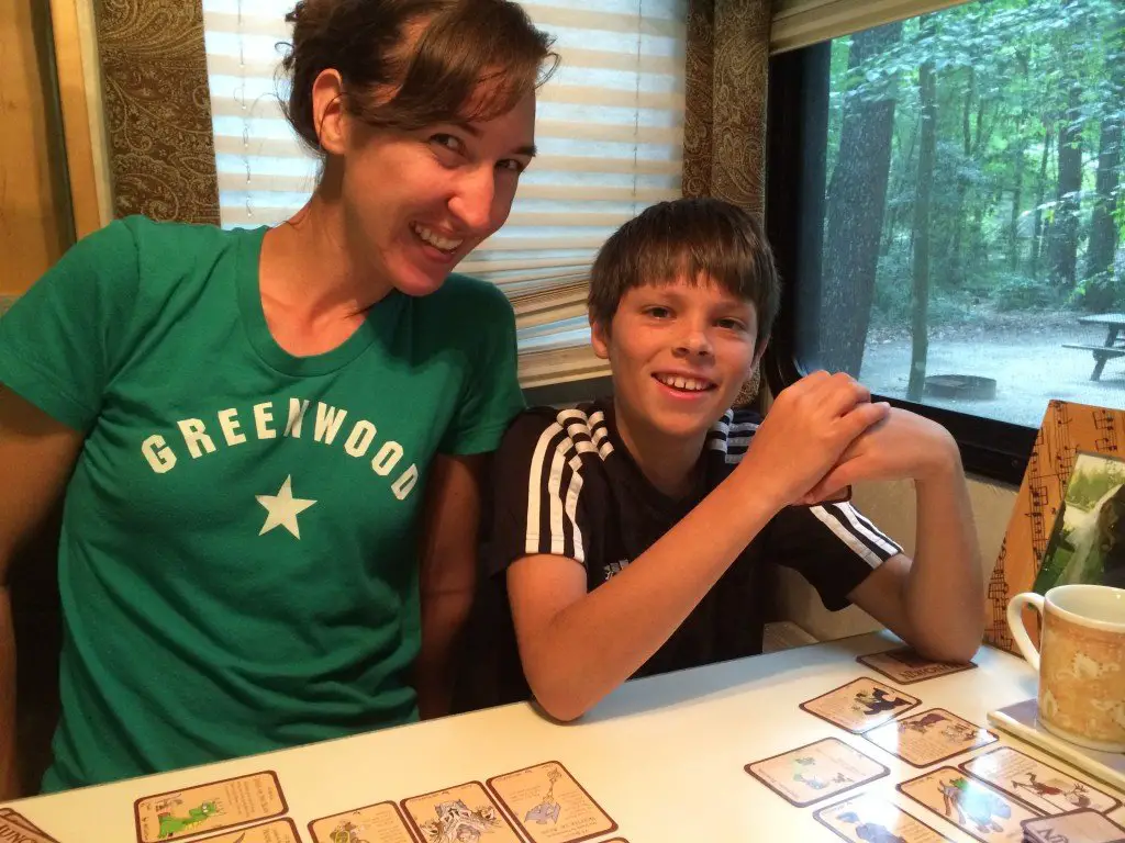Brittany and Javen Highland playing Munchkin Pathfinder