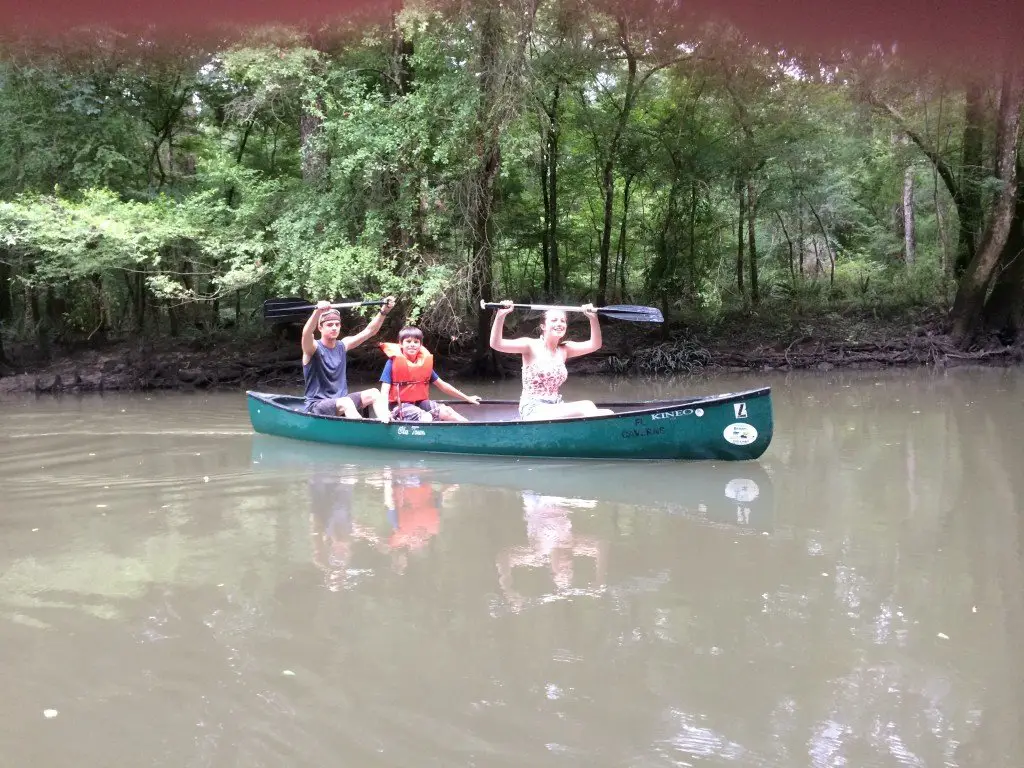 just learning to canoe, the highland kids show a victory cry