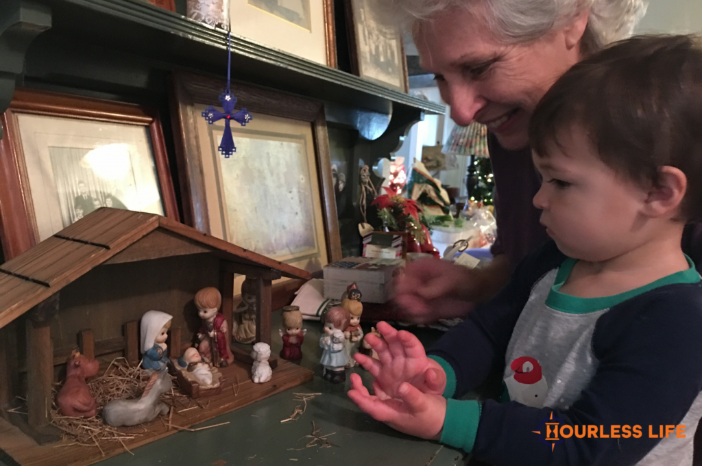 Caspian Highland Setting Up Nativity Scene With His Grandma