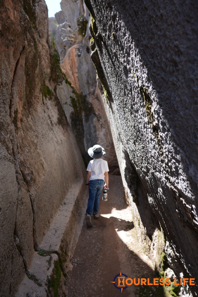 Walking through ruins of Q'enko in Cusco, Peru